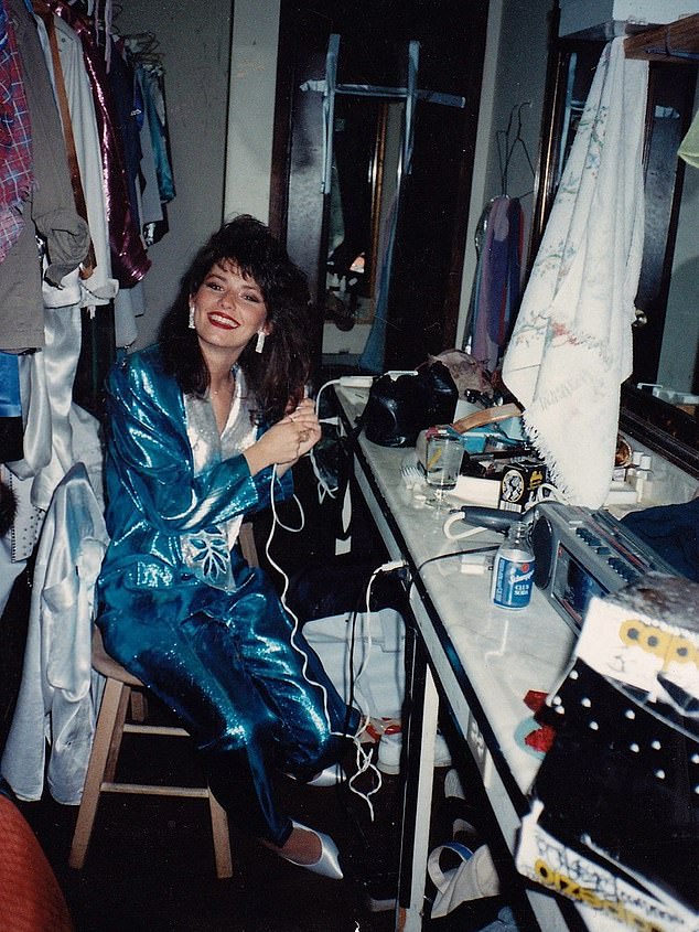 The first image captured a young Shania backstage in the 1980s, dazzling in a sparkling electric blue suit and rocking a classic big-80s hairdo, her grin lighting up the dressing room