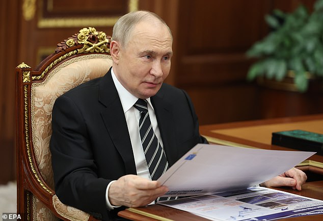 Russian President Vladimir Putin meets with Saratov Region Governor Roman Busargin at the Kremlin in Moscow, Russia, 28 August 2025