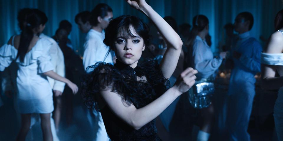 Wednesday Addams dancing at a party.