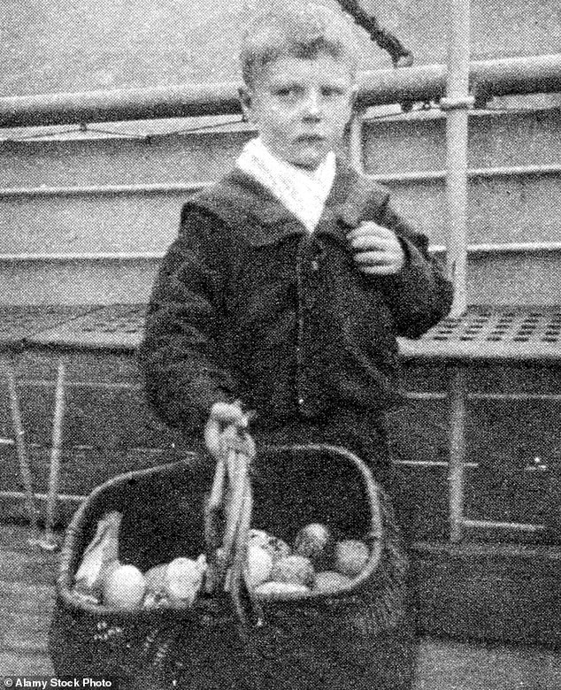 A boy selling eggs in St Kilda as residents leave for the last time, 1930