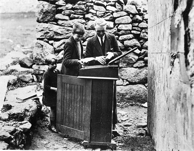 St Kilda residents pictured with their belongings as they prepare to leave the island