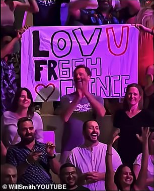 Another sign seemed to read 'LOV U FR6SH CRINCE'