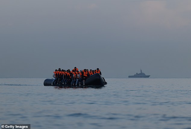 In a speech in Oxfordshire on Tuesday morning, Mr Farage unveiled his party's 'Operation Restoring Justice' proposals to tackle the Channel migrant crisis. Pictured: A group of people believed to be migrants on a small boat near Gravelines, northern France