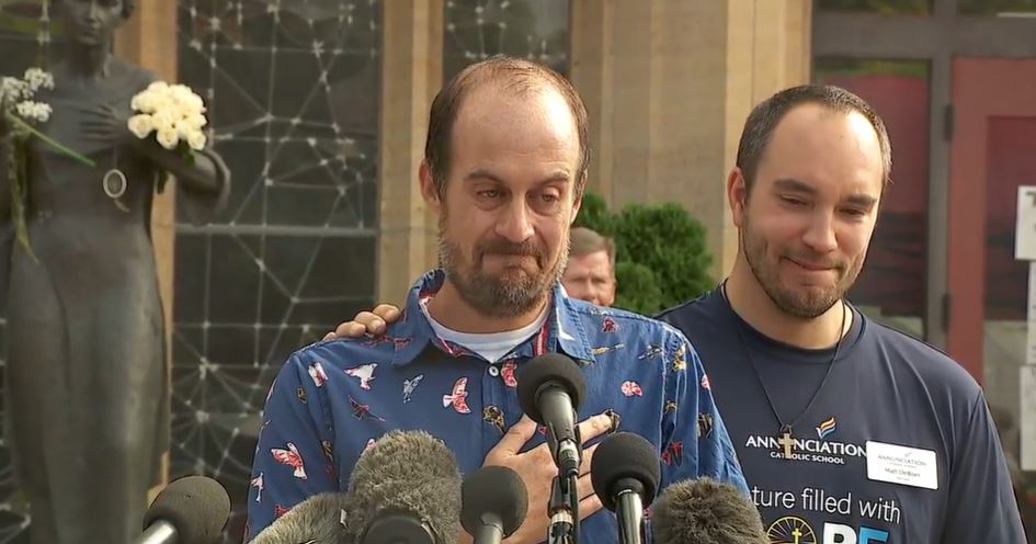 Father of school shooting victim at press conference.