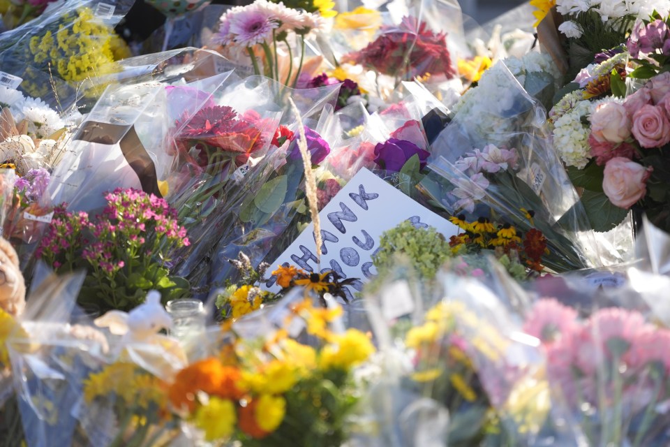 Memorial of flowers and notes.