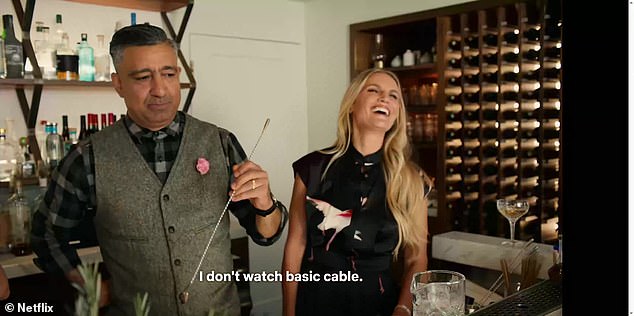 When Meghan asked whether he watched her show Suits, Payman (left, with Heather Dorak) brutally replied: 'No, no, I don't watch basic cable'