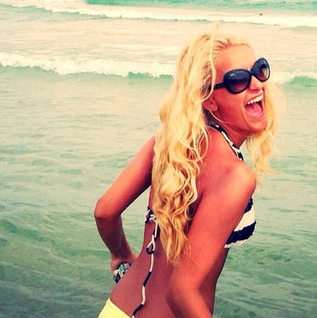 Magdalena Kralka, a Polish crime boss, on a beach.