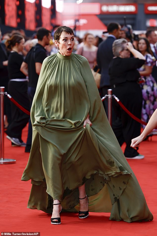 The actress lifted the dress as she made her way along the red carpet