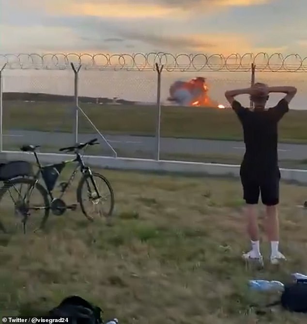 Horrified onlookers shouted and held their hands to their heads as the crash unfolded in front of them today during an airshow rehearsal in Radom, central Poland