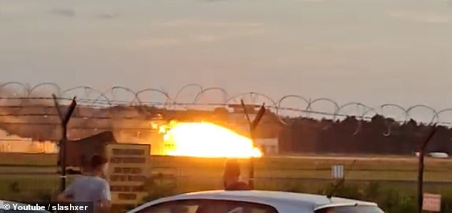 A military police investigation has been launched into the crash. Pictured: The plane erupts into a fireball as it hits the ground