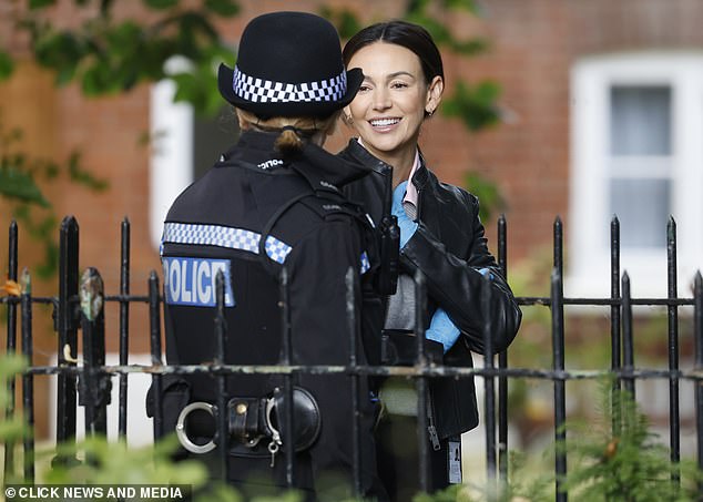 Michelle looked in good spirits as she was seen talking animatedly to a co-star on set