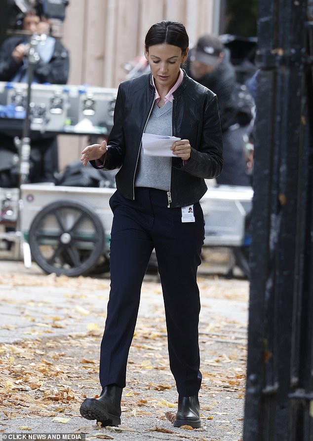The TV icon was pictured reading and learning her lines in between takes