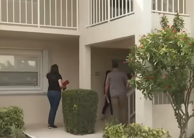 15045789 Moment cops descend on condo of Minneapolis school shooter's mom after she refused to cooperate with investigation as eerie previous police visits to her home emerges