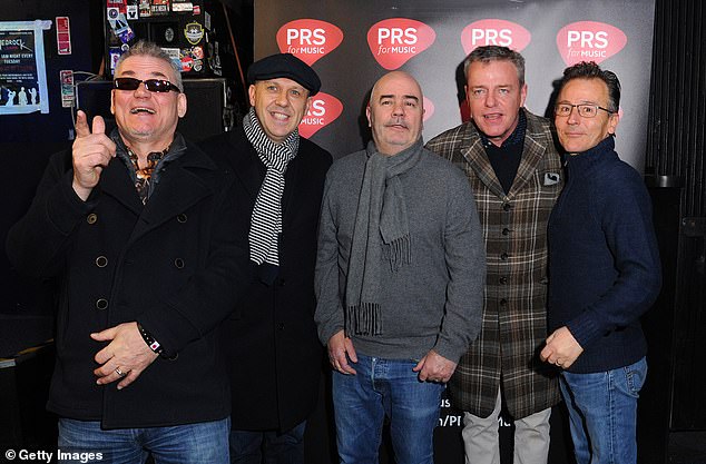 Chris - pictured with his bandmates Mike Barson, Mark Bedford, Suggs and Dan Woodgate in 2017 - penned an emotional tribute to his group