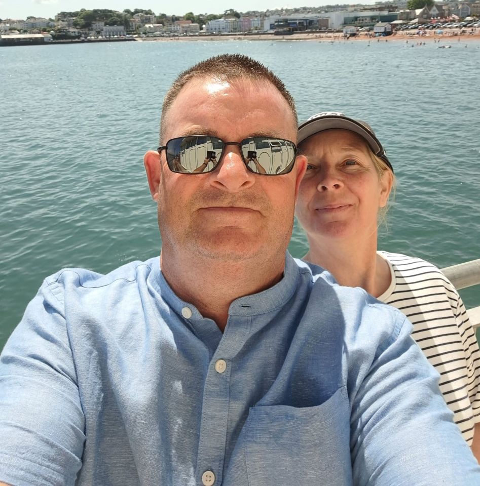 Selfie of a couple by the sea.