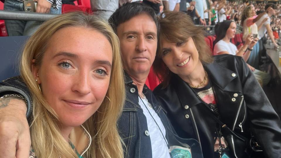 Sonny Marr with her parents, Johnny and Angie Marr.