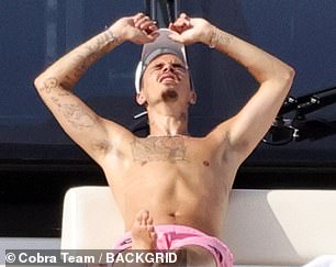 He was soaking up the sunshine on their relaxing trip