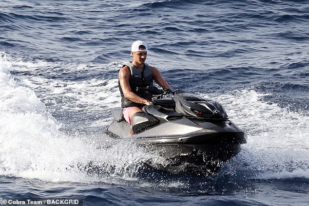 He later jumped on the back of a jet ski to head out on a solo ride