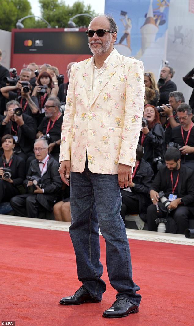 Italian director Luca Guadagnino wore a floral blazer which he paired with blue denim jeans and black dress shoes