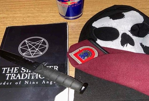 A photo taken from another criminal who was inspired by the terror groups with items showing their affiliations to Order of the Nine Angles
