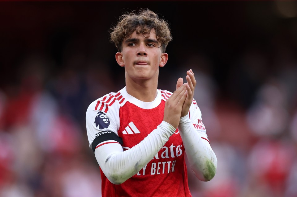 Max Dowman of Arsenal clapping during a Premier League match.