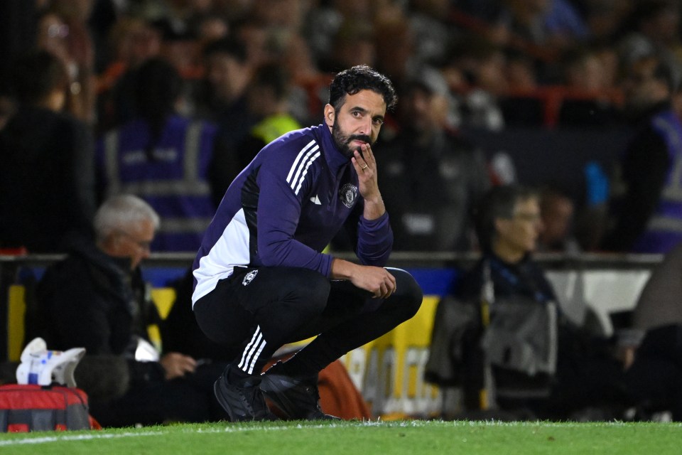 Ruben Amorim, Manchester United manager, looks dejected on the sidelines.