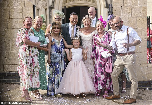 Lorraine's gorgeous dress boasted a boat neck and chic polka dot print which she teamed with a traditional veil and pearl jewellery