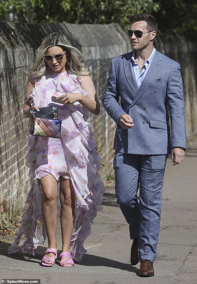 Actor Danny Walters, 32, looked smart in a pale blue suit but decided to forgo a tie as he joined long-term partner Maddi, five months after the couple welcomed their first child, baby daughter Autumn