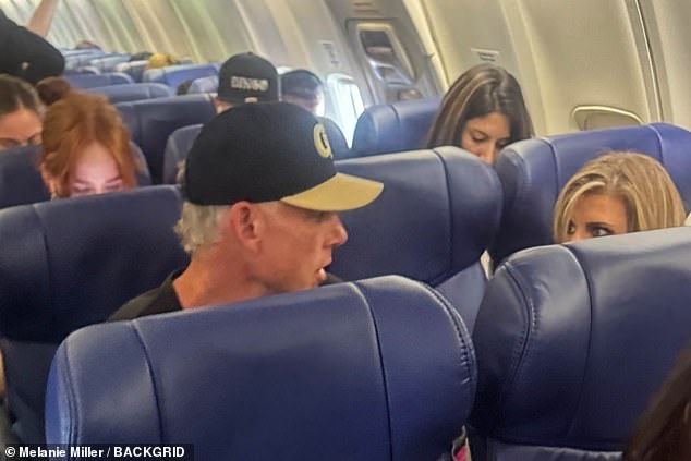 It seemed to be quite the intimate affair between the two as their children were nowhere to be found on the Las Vegas bound Southwest Airlines jet