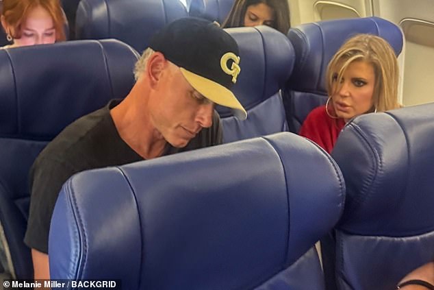 The 45-year-ole Irresistible hitmaker was seen sitting next to the 45-year-old former NFL player on board of a commercial plane at Burbank Airport on Friday