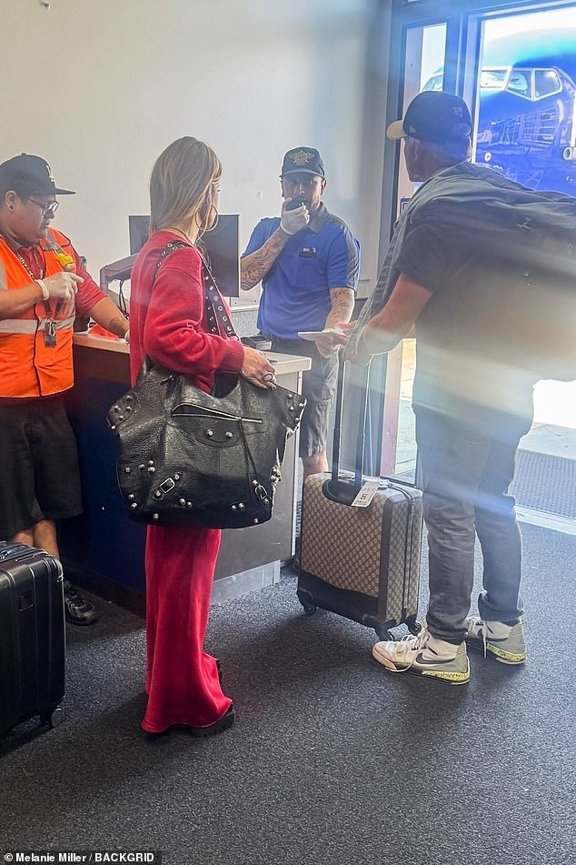 The two were seen checking in to their flight