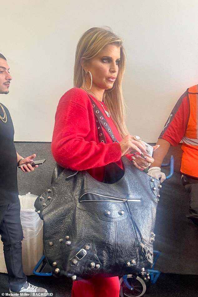 The singer accessorized with a pair of massive gold hoop earrings