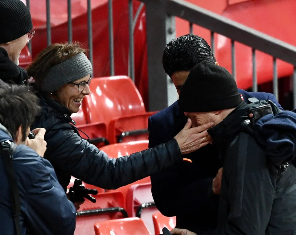 Parents of Thomas Tuchel speaking with Nasser al-Khelaifi at Old Trafford.