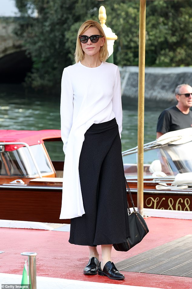 The actress tied the look together with a pair of Freda Salvador black leather loafers, embossed with a crocodile skin pattern