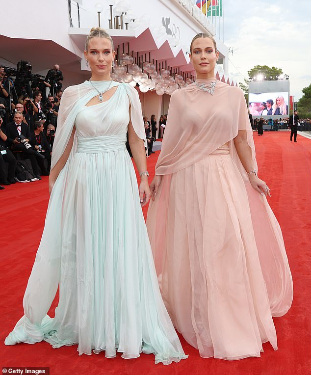 Identical twins Lady Amelia (left) and Lady Eliza Spencer, 33, stunned at the premiere of After The Hunt at the Venice Film Festival in matching pastel-coloured outfits