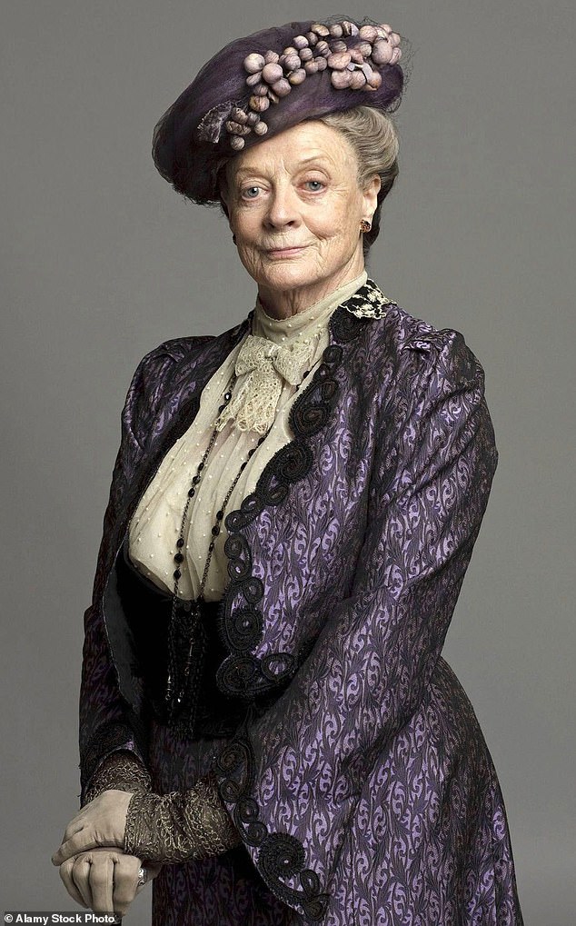 Julian Fellowes says the late Dame Maggie Smith (pictured) was 'absolute bliss' to work with on the hit ITV period drama Downton Abbey