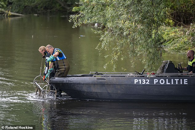 Police have been spotted (as seen above) searching the water near to the hostel where the migrant was living
