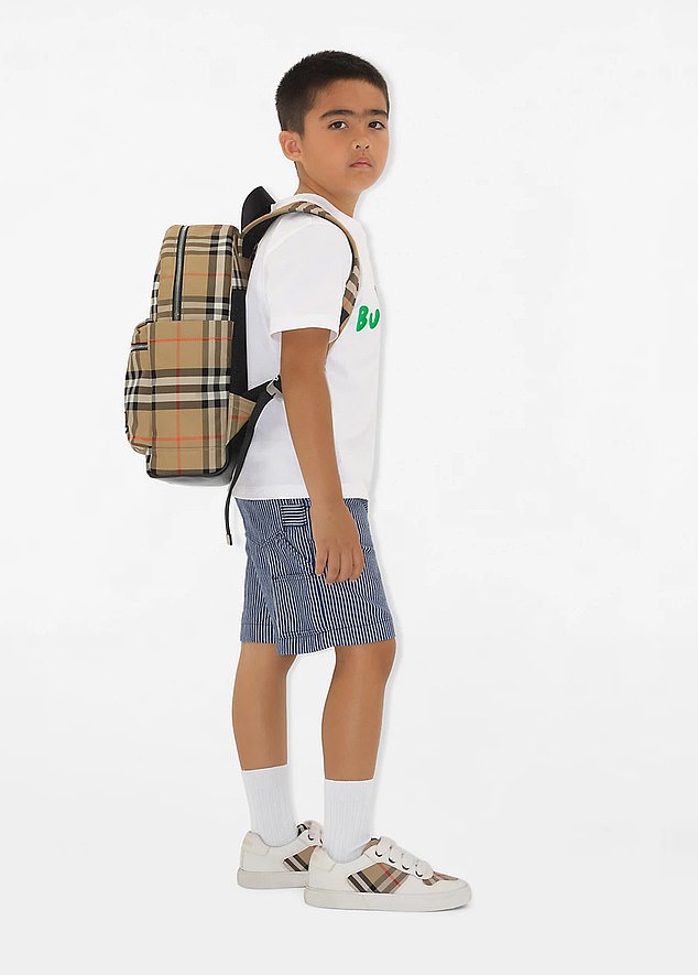 It promises to take 'childrenswear from the playground to the classroom in style'. But Burberry's back-to-school range (pictured) will cost parents thousands for the privilege – with a pencil case alone costing £210