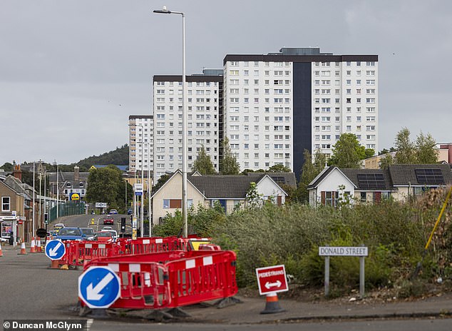 Lochee's 'multis' are known for violence and squalor, with the area like a ghost town after 5pm