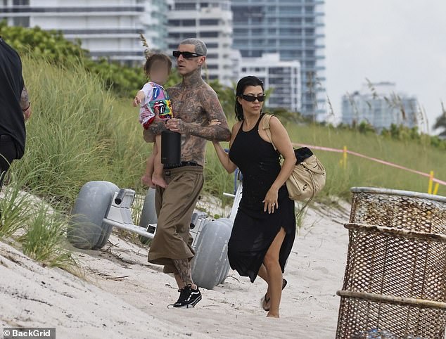 The 46-year-old reality star was seen on vacation with 49-year-old musician husband Travis Barker and their 21-month-old son Rocky Thirteen