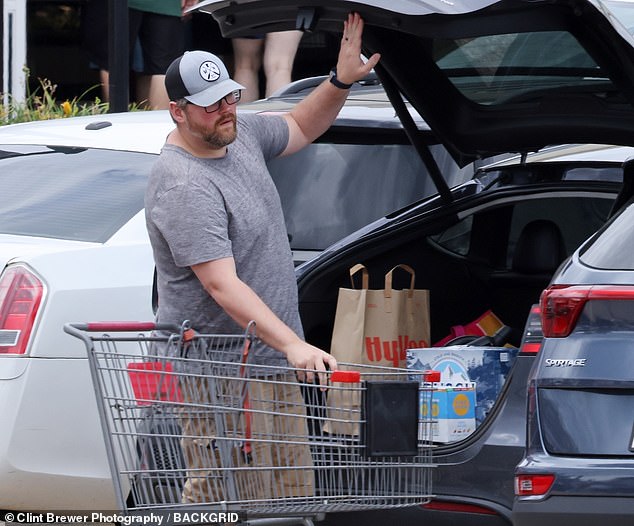 Abby's husband, Josh Bowling (pictured), was nearby picking up what appeared to be adult refreshments