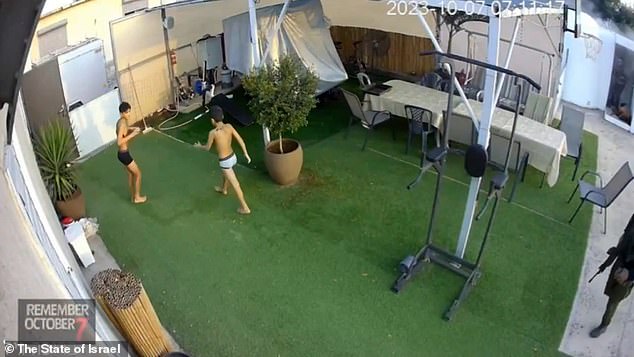 The video shows Gil Taasa desperately grabbing one of his sons and running with another in their underwear to what looks like a shelter in their garden