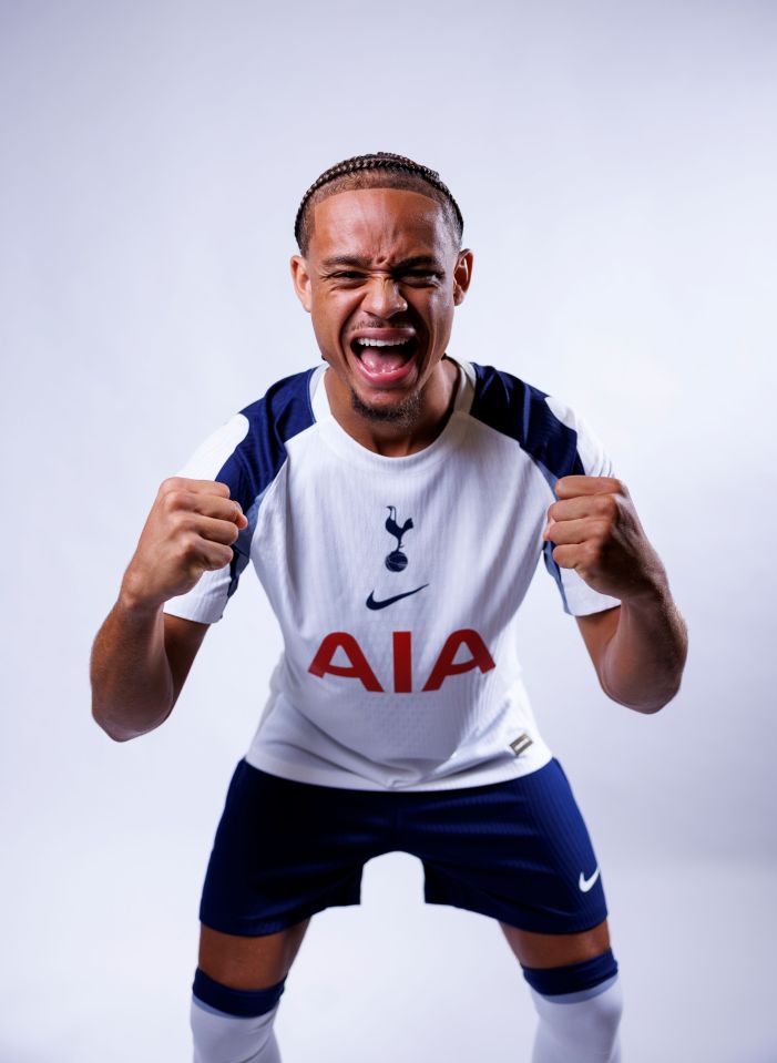 Xavi Simons in Tottenham Hotspur uniform, celebrating.