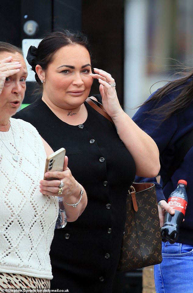 Pictured: Allarakhia, in black, appearing at court. It was heard how her partner had also sustained injuries in the crash, and was found that one of her daughters had not been wearing her seatbelt