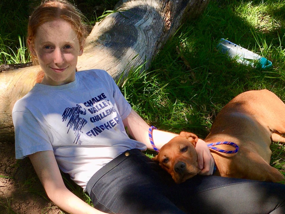 Photo of Ruth Szymankiewicz with her dog.