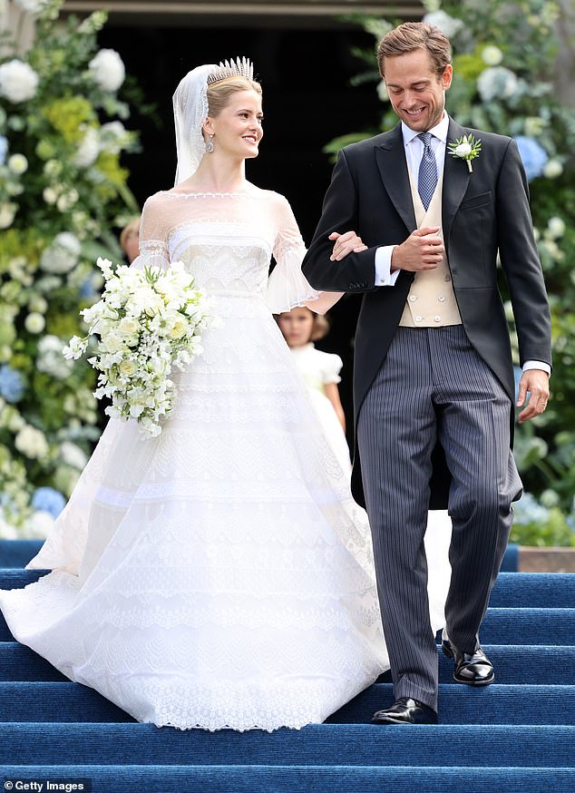 Princess Marie Caroline of Liechtenstein and her new husband Leopoldo Maduro Vollmer are pictured on their wedding day
