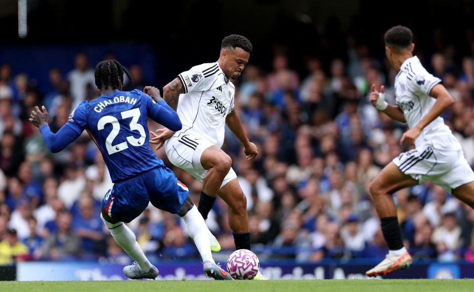 Fulham's Rodrigo Muniz fouls Chelsea's Trevoh Chalobah.