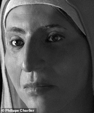 Their reconstruction shows a pretty woman with a pointed nose, high cheekbones, and a round face, wearing a white scarf on her head
