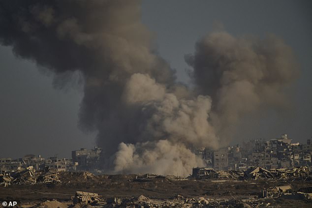 Smoke rises to the sky following an Israeli military strike in the northern Gaza Strip, as seen from southern Israel, Saturday, Aug. 30, 2025