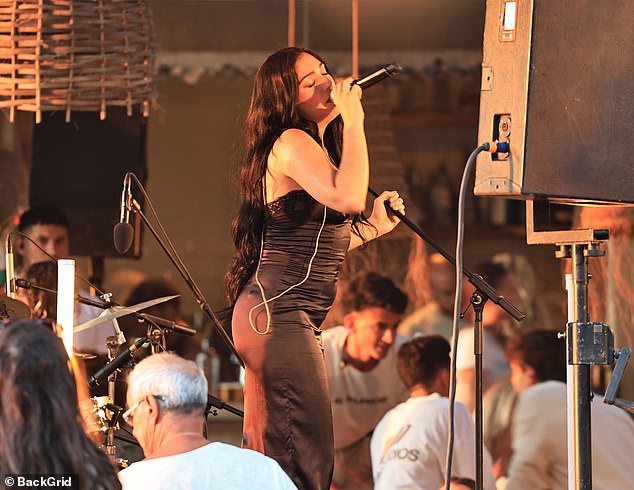The singer-dancer, 28, who is the daughter of Queen of Pop Madonna, took to the stage at beach restaurant and bar El Silencio in Cala Molí, Ibiza